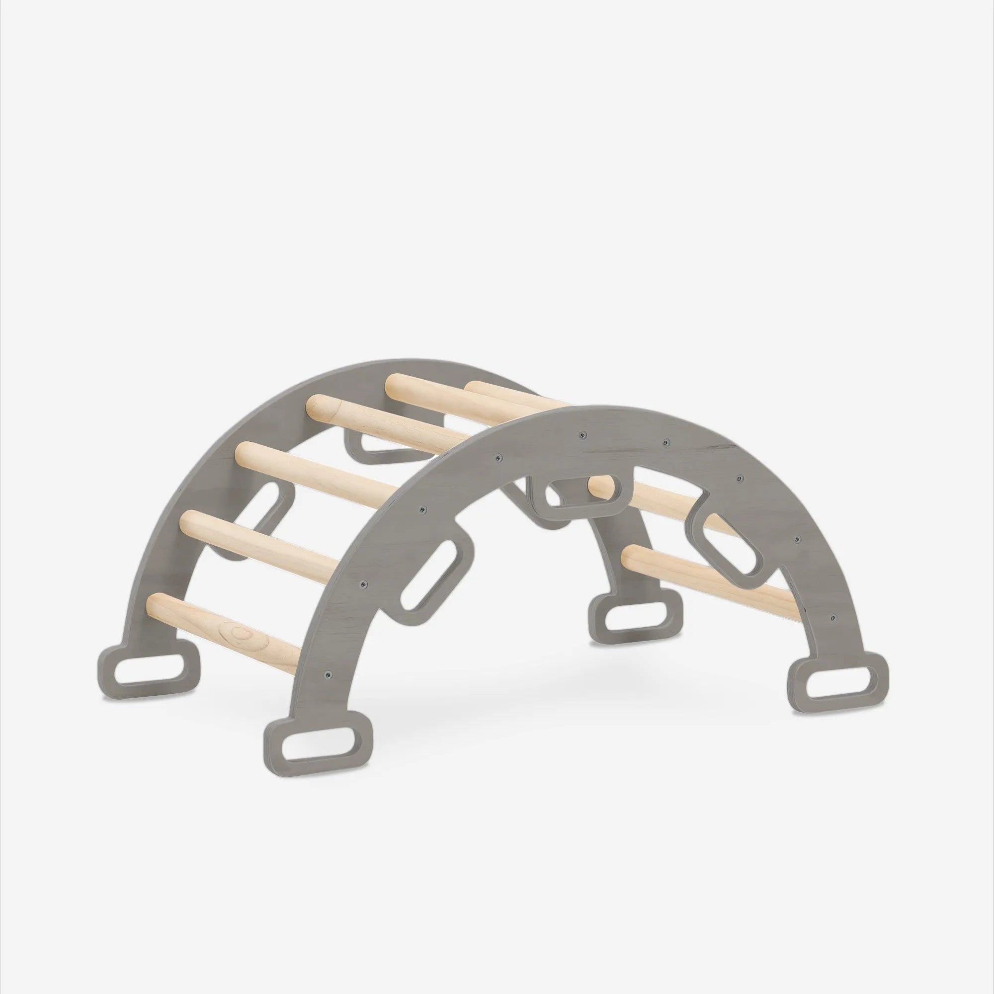 The DERYAN wooden climbing frame in gray consists of a foldable triangle with a climbing arch and a ramp with slide. The climbing frame is made of wood and intended for indoor use by young children during play and exercise.