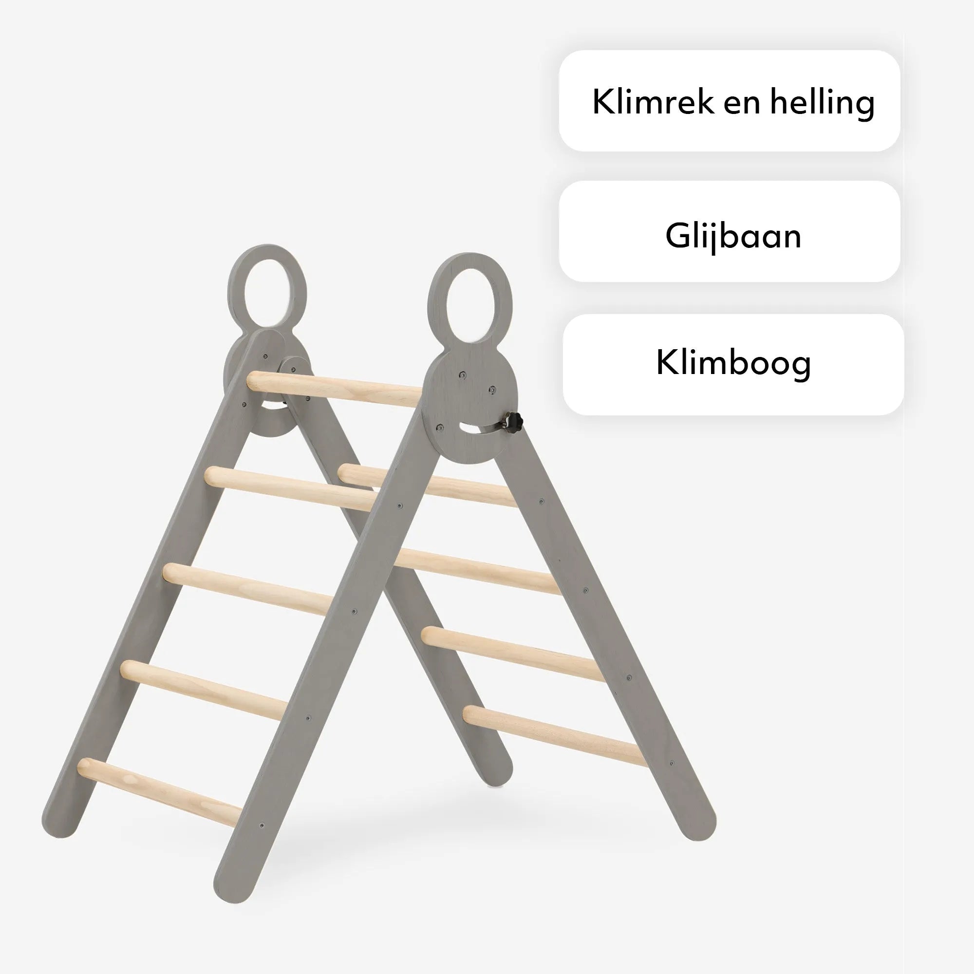 The DERYAN wooden climbing frame in gray consists of a foldable triangle with a climbing arch and a ramp with slide. The climbing frame is made of wood and intended for indoor use by young children during play and exercise.