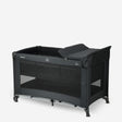 Luxury camping bed, black, including carrying bag, changing pad, and base riser