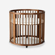 Willow Round Wooden Playpen in Warm Brown, Includes Mattress and Wheels